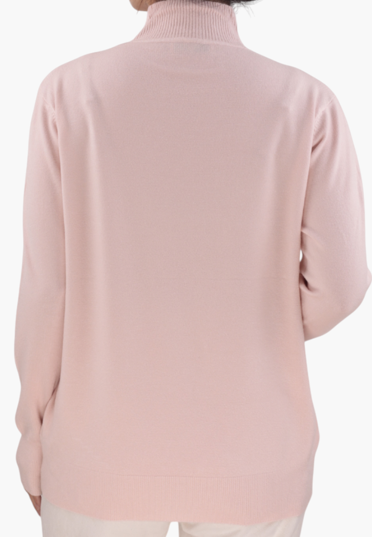 Back view of a pink turtleneck sweater with long sleeves.