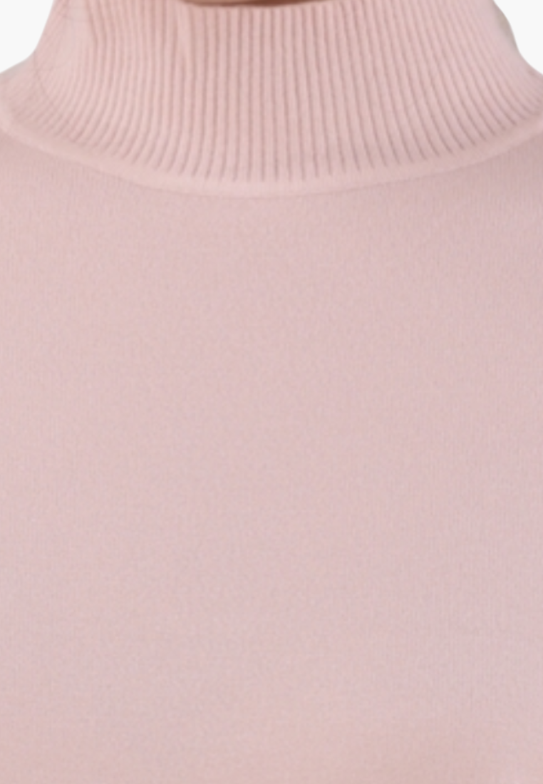 Detail close-up of a pink turtleneck top with a smooth fabric.
