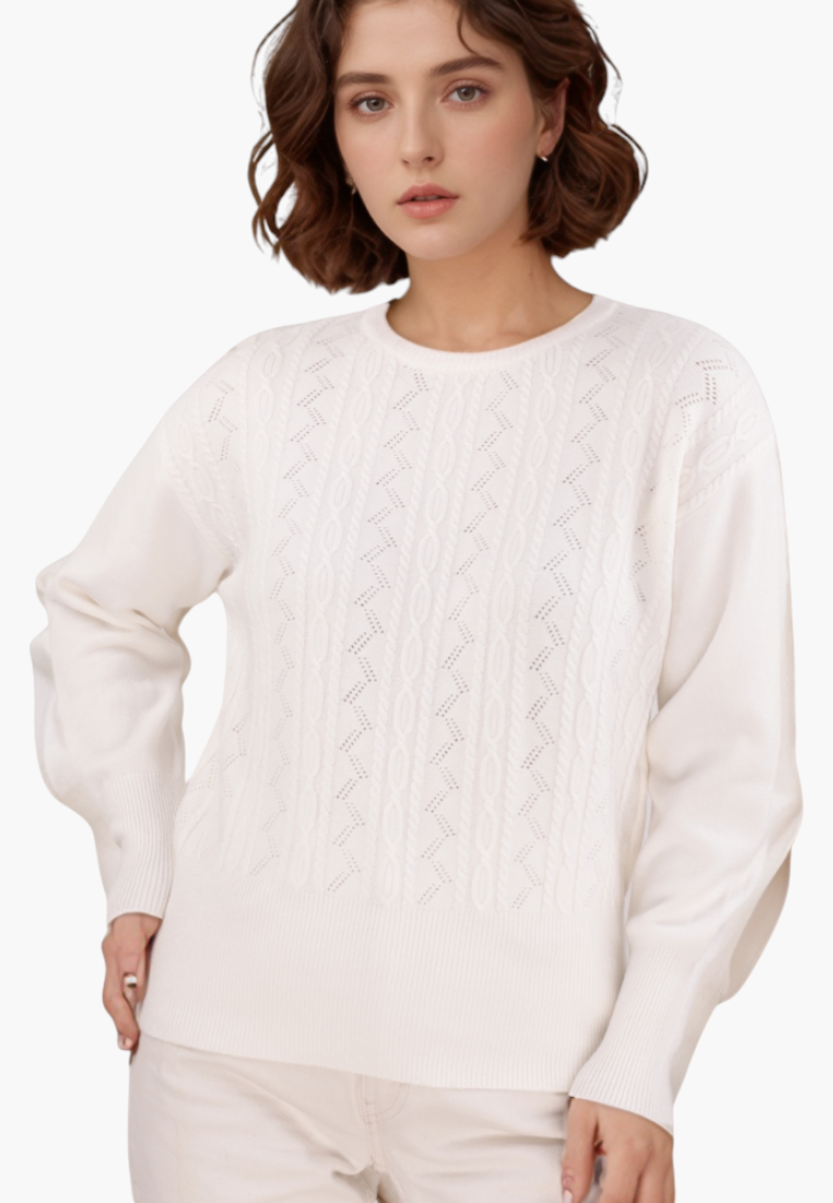 Front view of a cream sweater featuring long sleeves and knit texture against a white background.