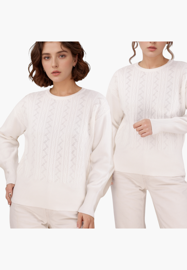 Lifestyle shot of a cream sweater with long sleeves and knit texture on a transparent background.