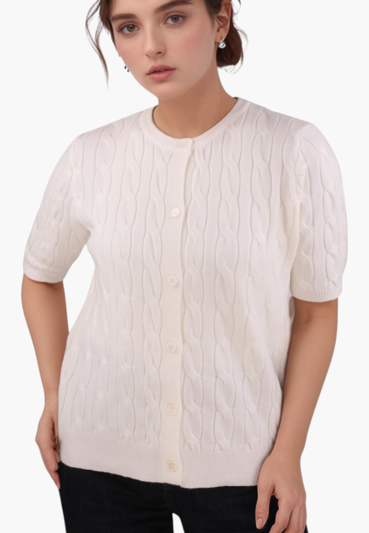 Front view of the cream short-sleeve sweter with button closure.