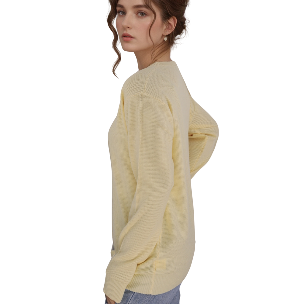 Back view of the żółty sweter damski featuring a simple design and long sleeves.