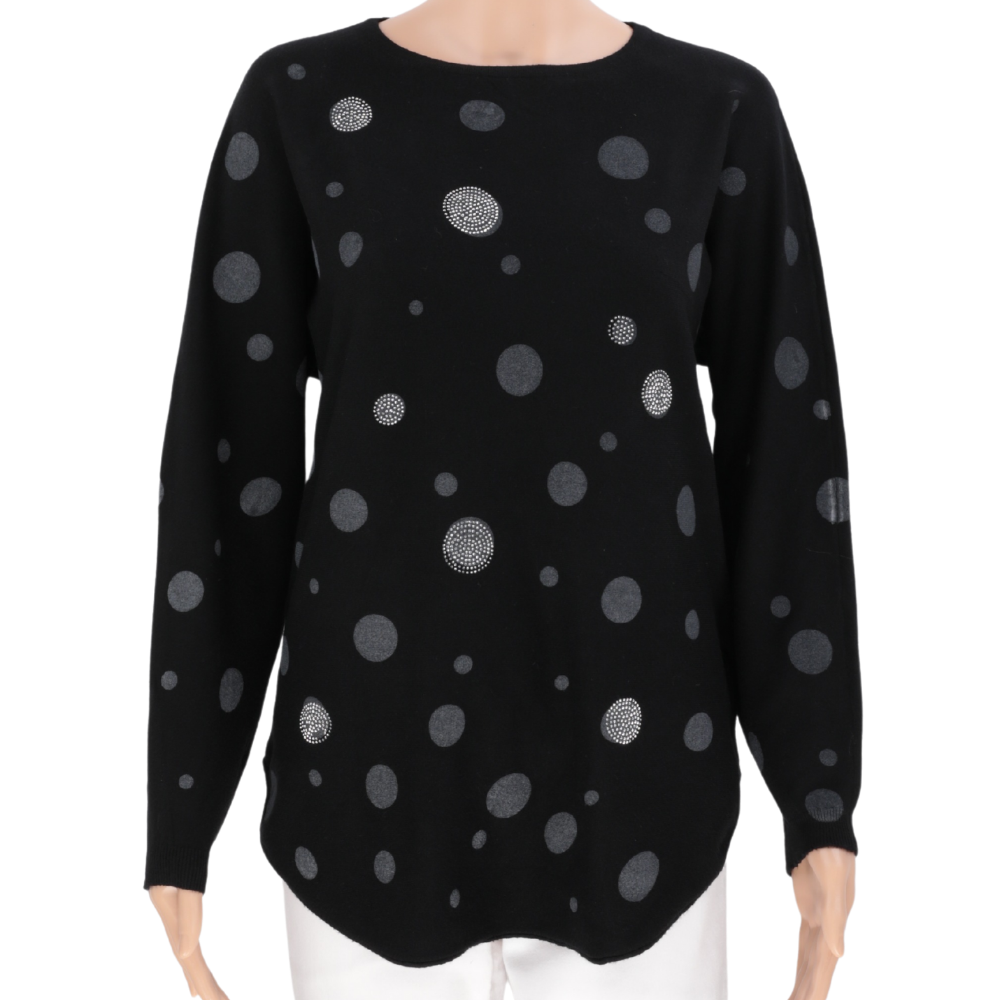 Front view of a black sweater with a polka dot pattern and long sleeves.
