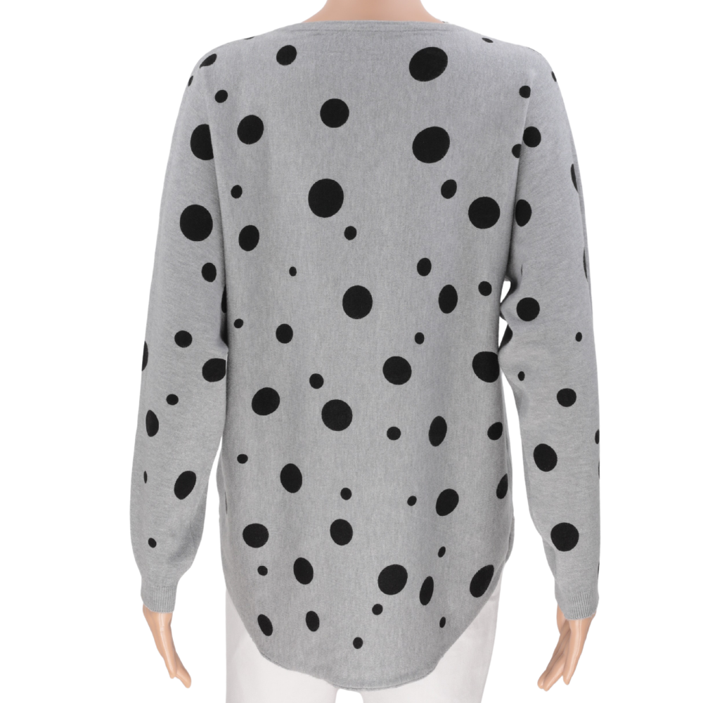 Back view of a gray polka dot sweater with long sleeves.