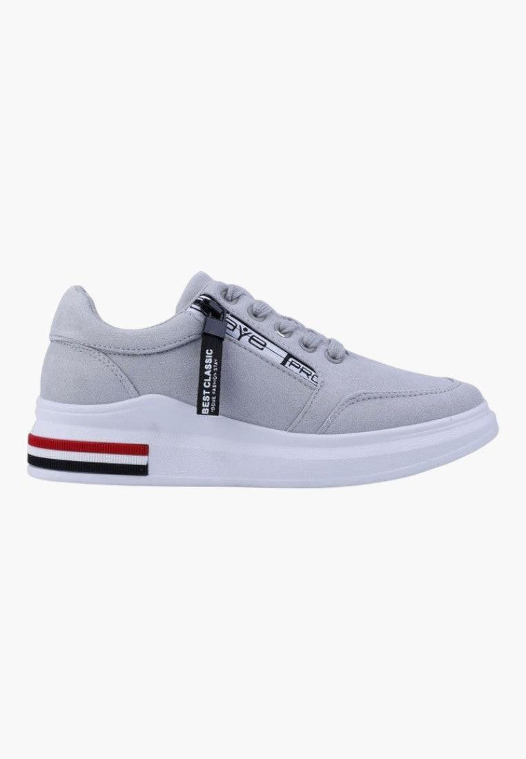 Bok szarych sneakersów damskich z kolorowymi lampasami.