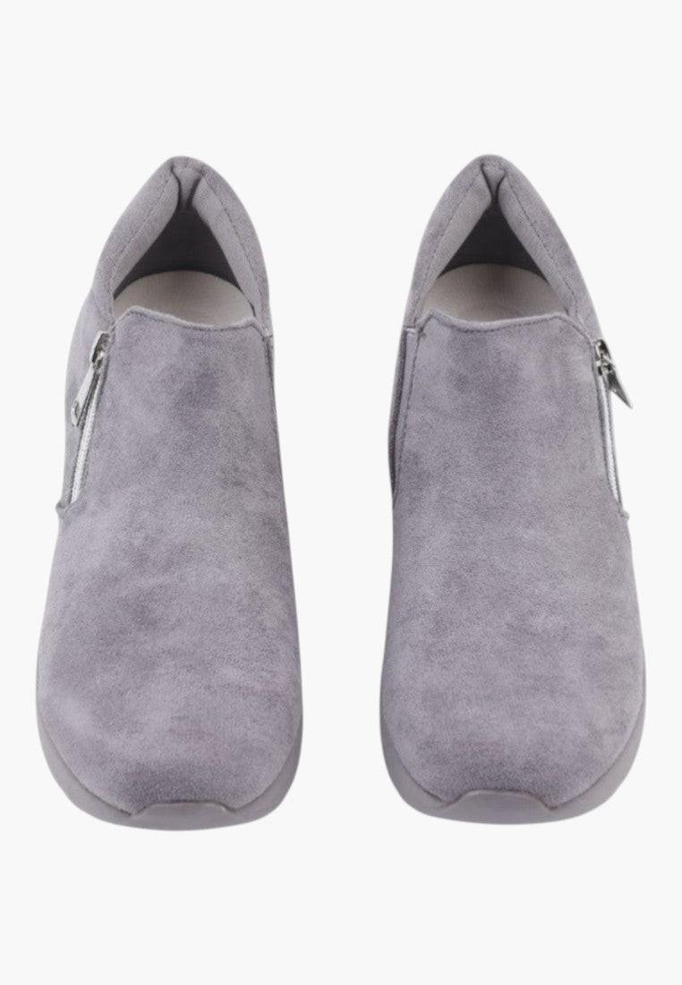 Front view of gray eco-suede women's sneakers showcasing the round toe.