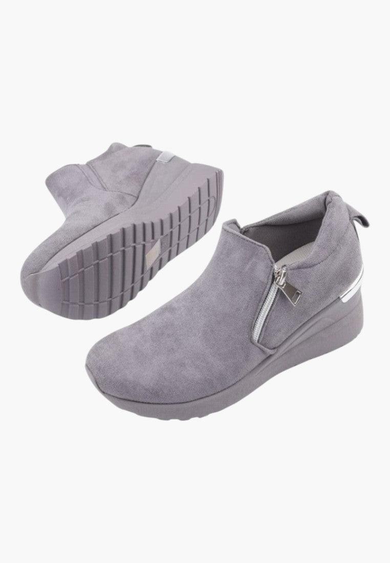 Different angle of gray eco-suede slip-on women's sneakers.