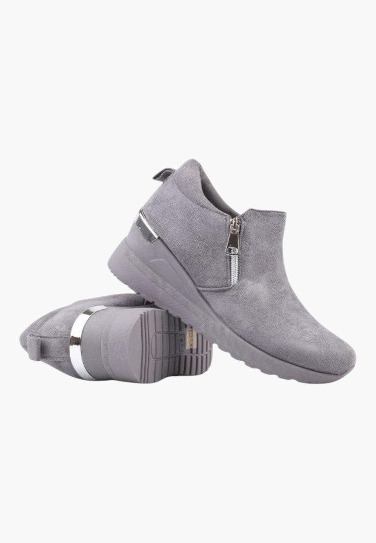 Side view of gray eco-suede women's sneakers highlighting the hidden wedge.