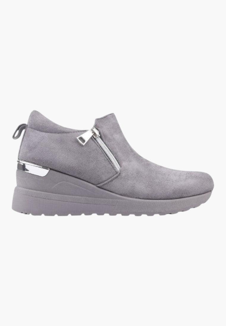 Side view of gray eco-suede women's sneakers emphasizing the design.