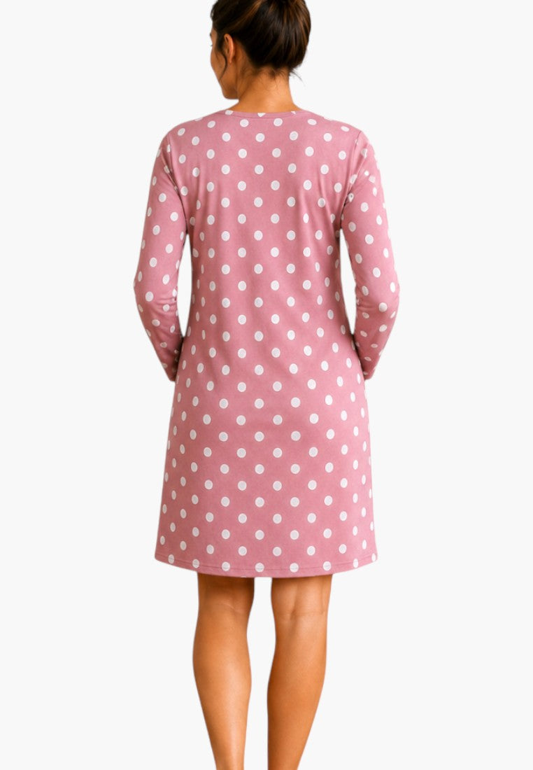 Back view of a pink cotton bathrobe with white polka dots and long sleeves.
