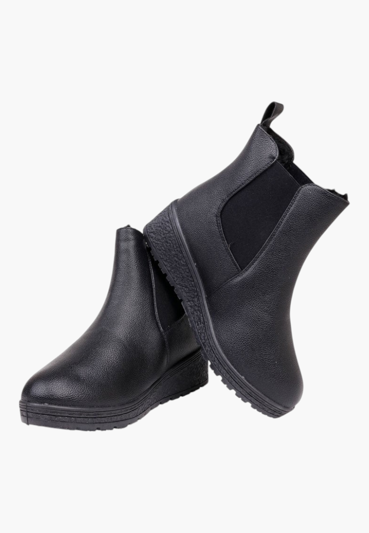 Back view of black ankle boots featuring stacked heel and dual pull tabs on a white background.