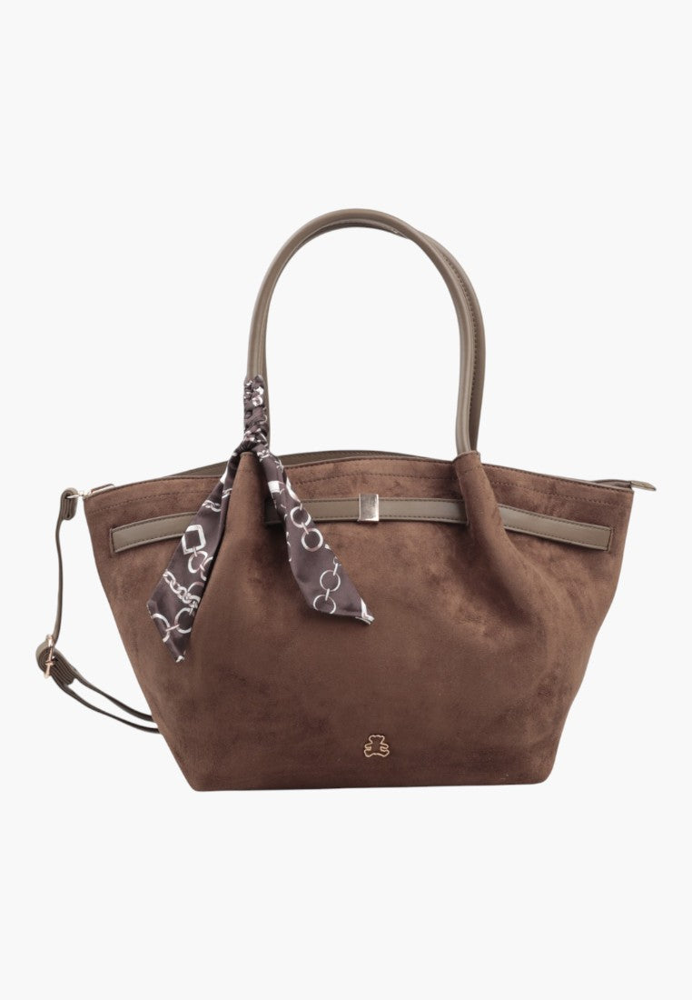 Front view of the taupe faux suede shopper bag featuring shoulder straps and decorative scarf.