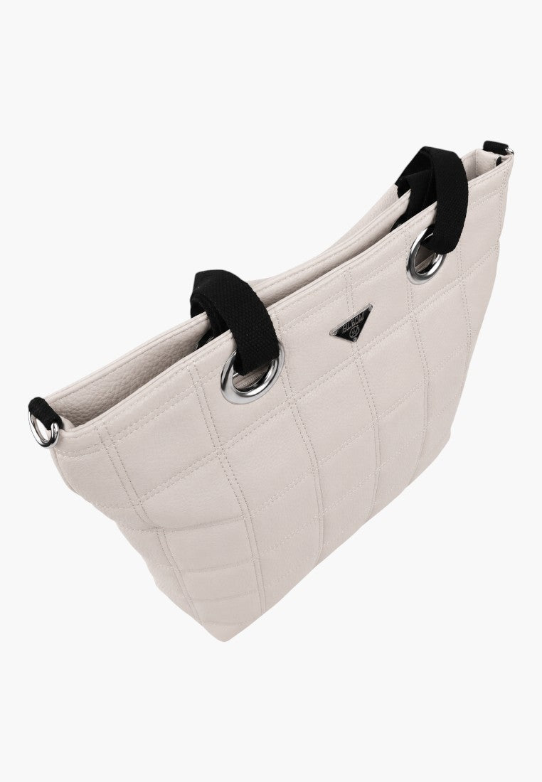 Pikowana torebka shopper z boku, w kolorze białym i czarnym, z podwójnymi uchwytami.