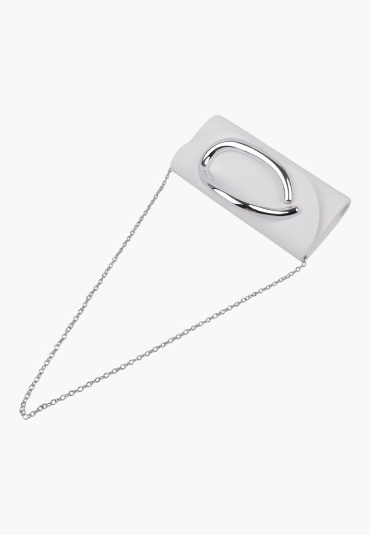 Detail of the silver clasp on the white clutch bag against a white background