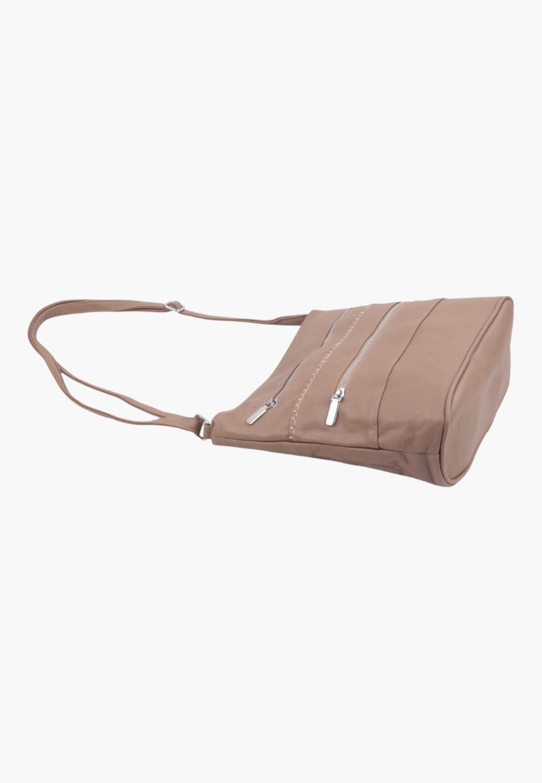 Side view of a brown shoulder bag with an adjustable strap and multiple pockets.