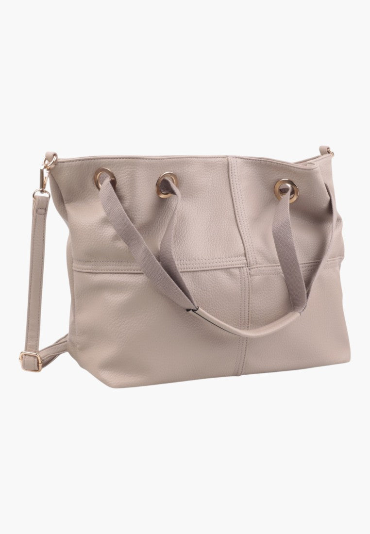 Side view of a wielokolorowa torebka damska shopper z dwoma uchwytami