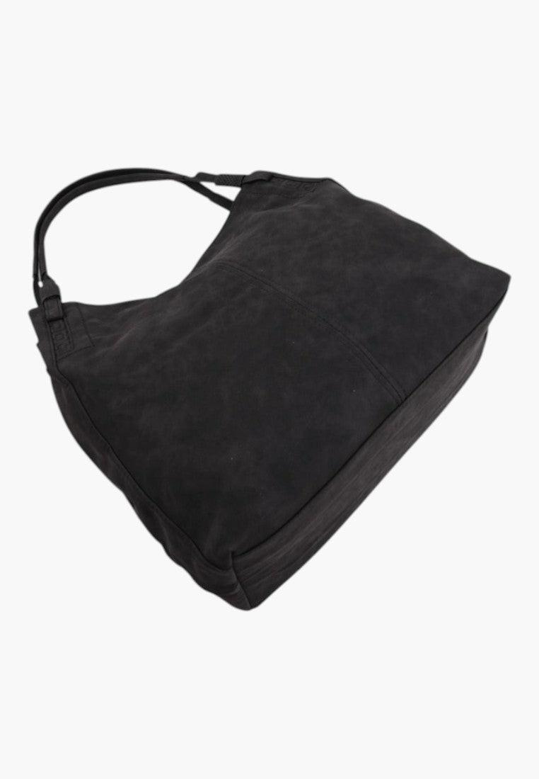 Szczegółowy widok wielokolorowej torebki damskiej shopper na ramię z miękką teksturą.