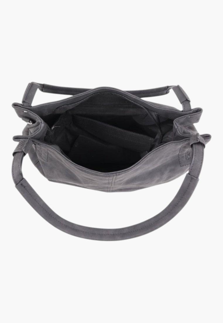Szczegółowy widok wnętrza wielokolorowej torebki damskiej shopper na ramię z wieloma przegródkami.